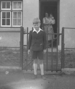 A young boy in shorts and jacket late 1930s from our Munster glass plate negative collection